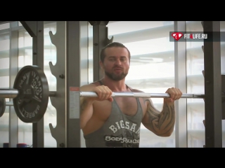 shoulder workout. bar press standing. denis borisov