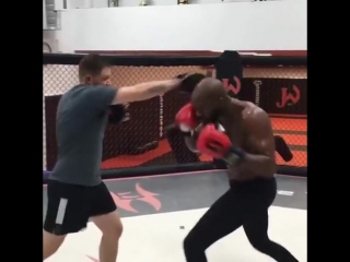 jon jones hitting mitts. start mma camp for cormier rematch