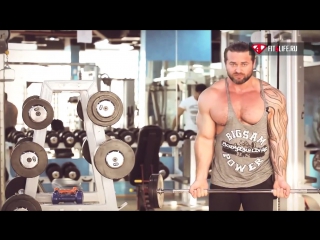 biceps workout. lifting the bar for standing biceps. denis borisov